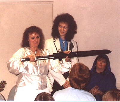 Misty, Larry and Need at Dreamcon 6 in Everett, Washington. See the QO newsletter for November 1991 for coverage of the event.